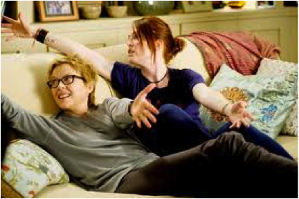 Figure 4. Annette Bening performing the masculin-ized Nic (left). Advocate.com. Web.